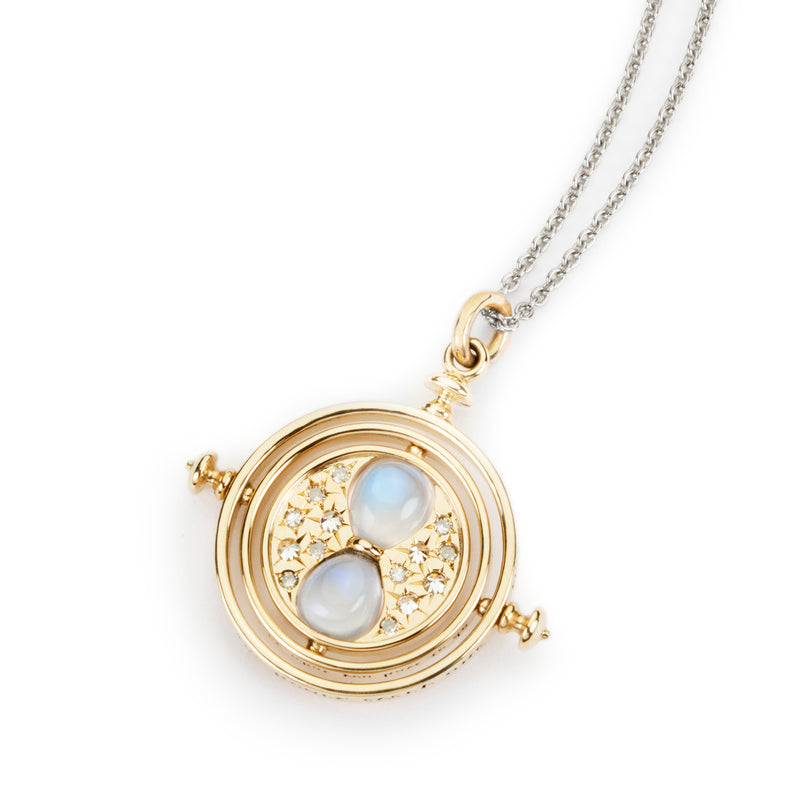 Fully spinning officially licensed Time Turner necklace made in 18k yellow gold set with diamonds and moonstone by Freeman Jewelry. Also available in 14k yellow or white gold, 18k rose gold, and platinum.