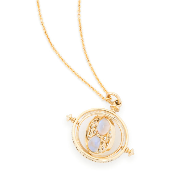 Fully spinning officially licensed Time Turner necklace made in 18k yellow gold set with diamonds and moonstone by Freeman Jewelry. Also available in 14k yellow or white gold, 18k rose gold, and platinum.