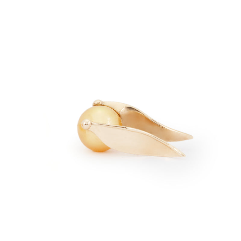 Close up of a single officially Licensed Harry Potter Golden Pearl Snitch Earring in solid 14k yellow gold on a white background. Also available in solid 18k yellow gold. 