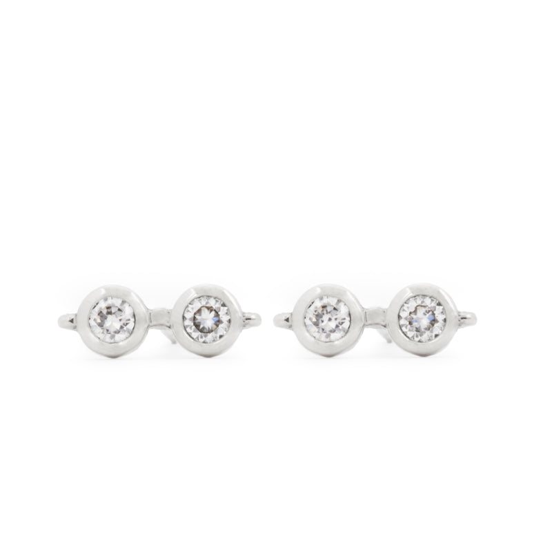 Front view of officially licensed Harry Potter Glasses Earrings in sterling silver set with natural diamonds on a white background. Also available in solid 14k and 18k yellow gold. 